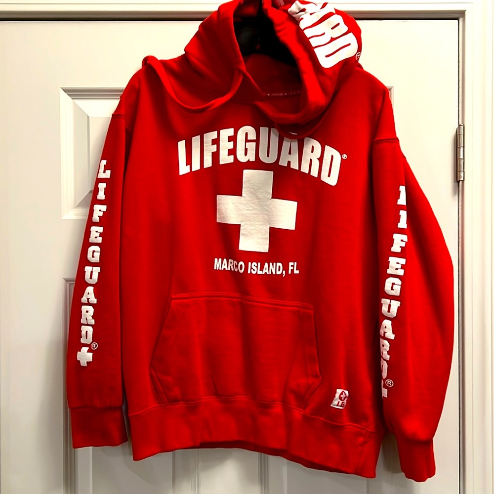 Marco Island, red lifeguard sweatshirt.